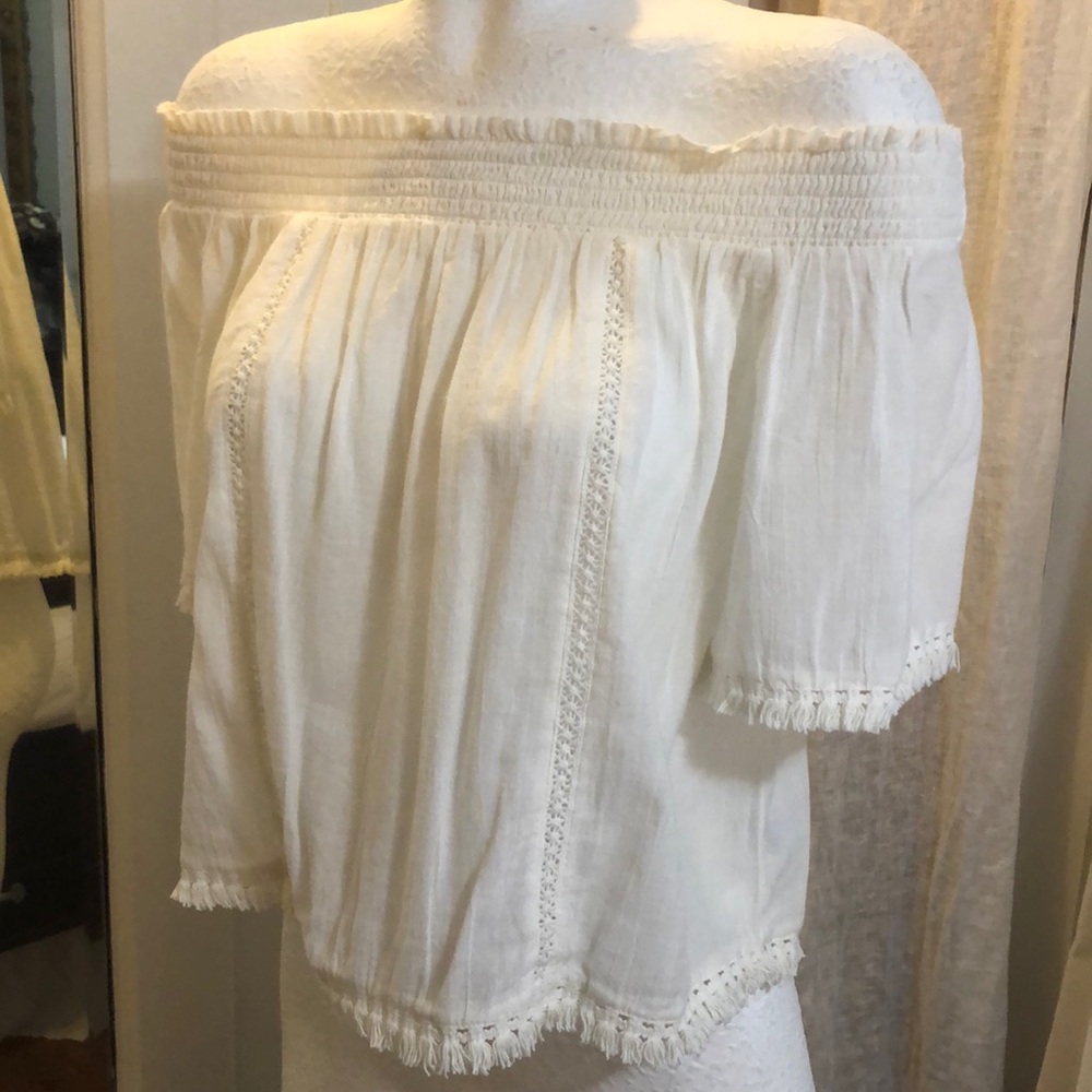 Off shoulder fringe shirt